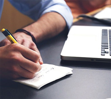 designer at work-station - link to drive design services page